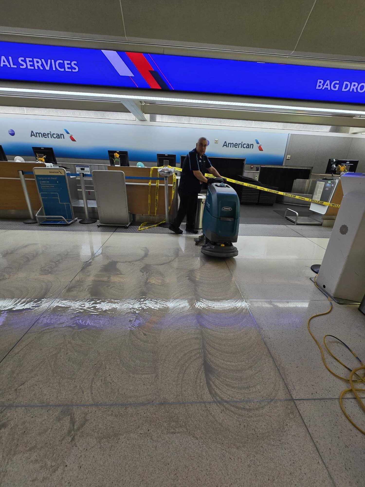 Professional floor polishing machine refining a concrete surface