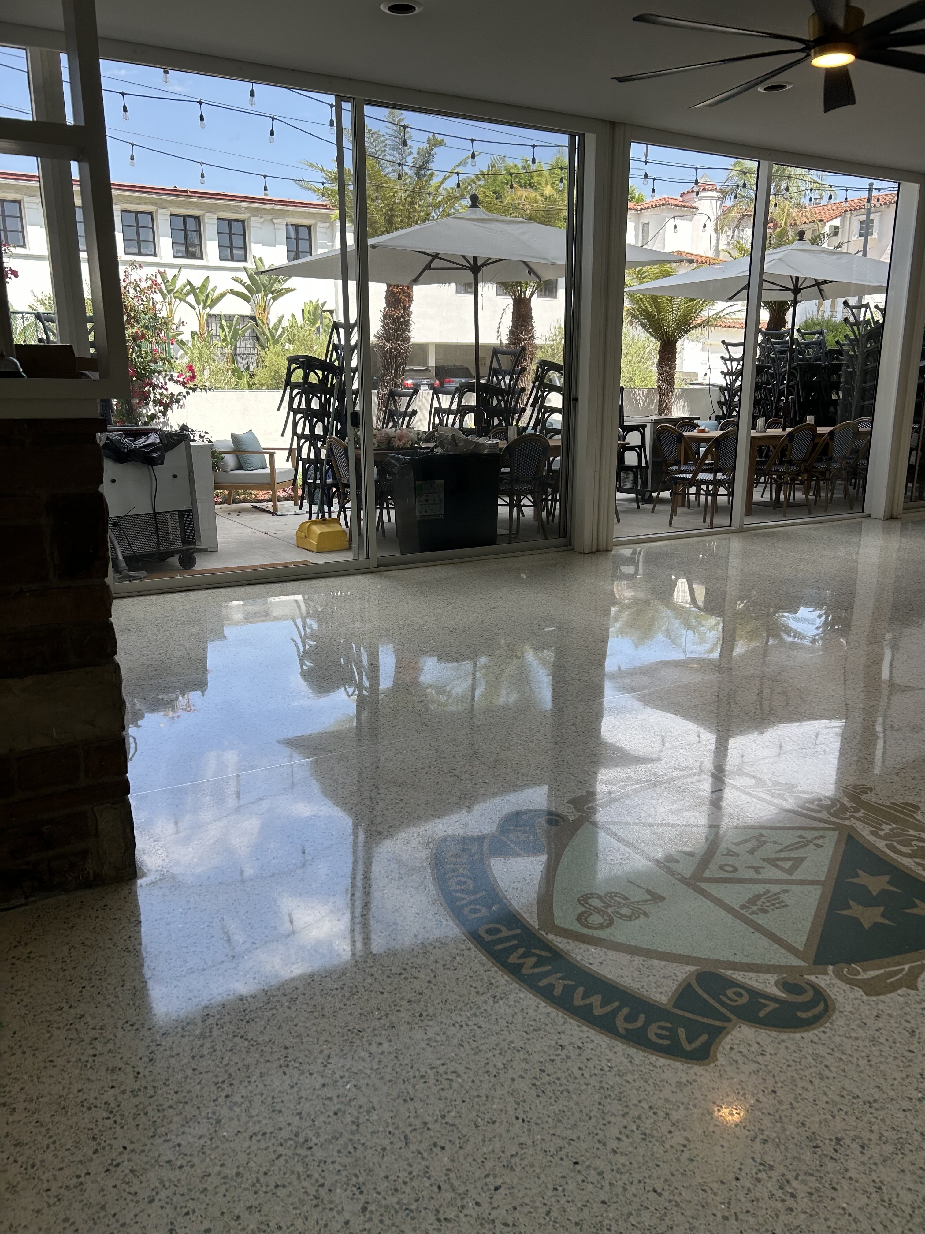 Glossy mechanically polished concrete floor with natural reflections